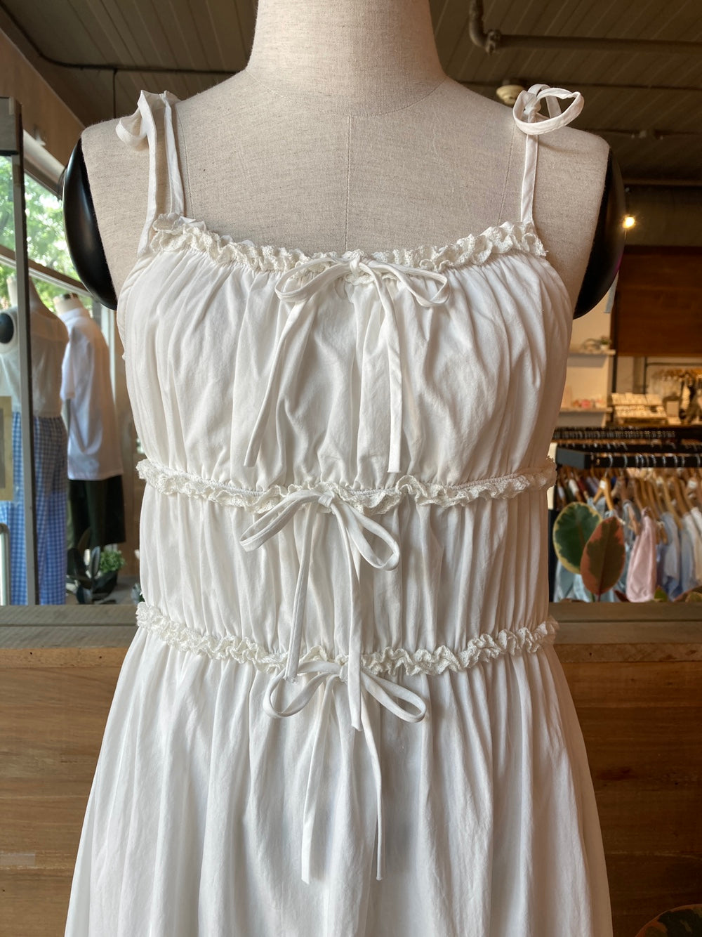 white shirred ruffle dress