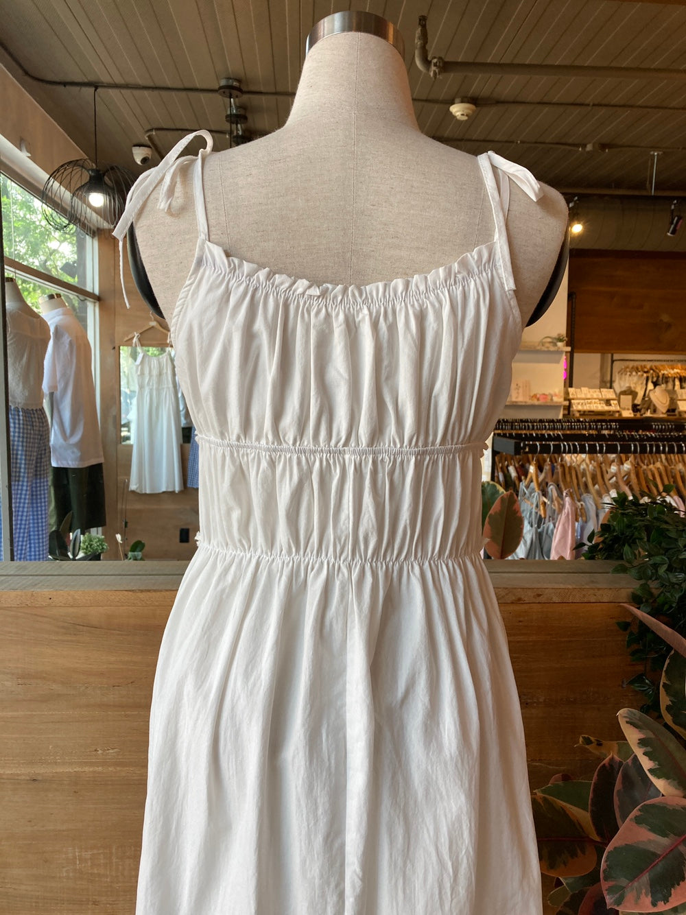 white shirred ruffle dress