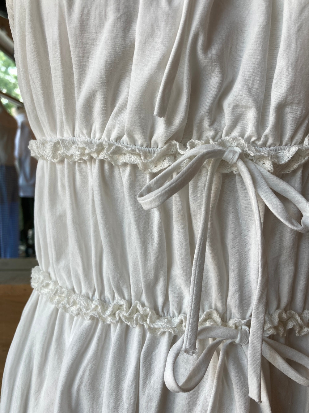 white shirred ruffle dress