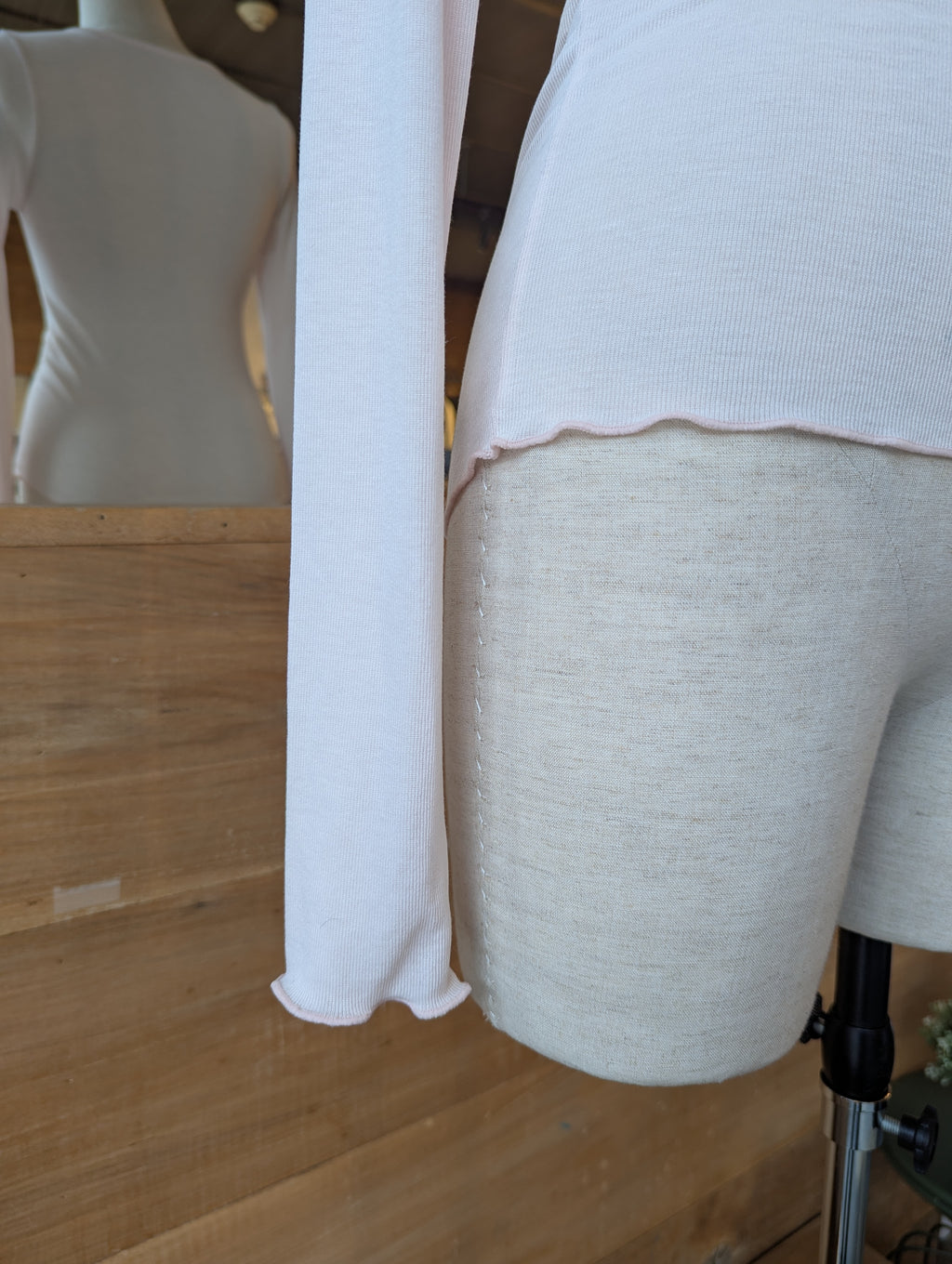 Sheer Soft Twist Lettuce Hem Top