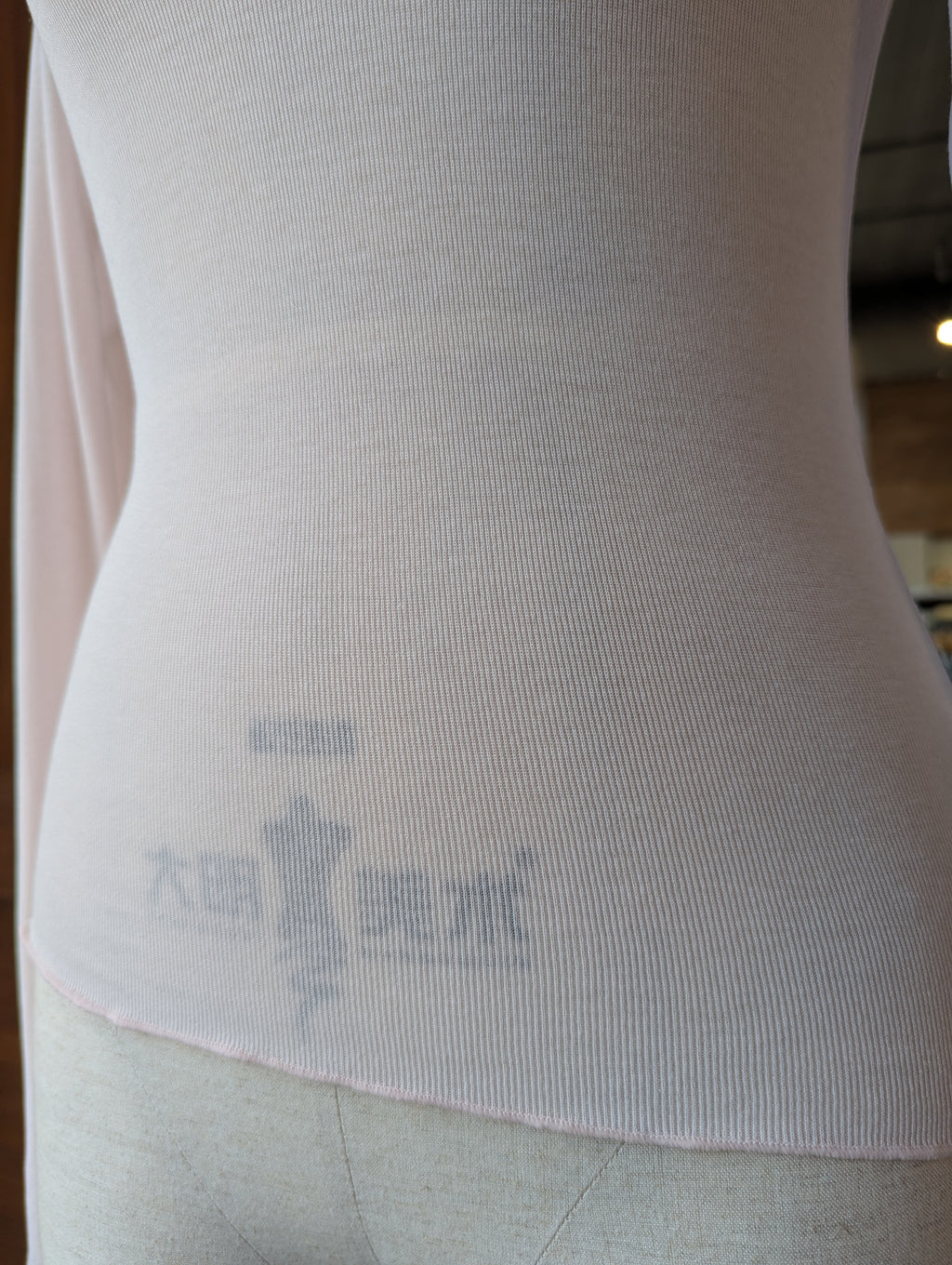 Sheer Soft Twist Lettuce Hem Top