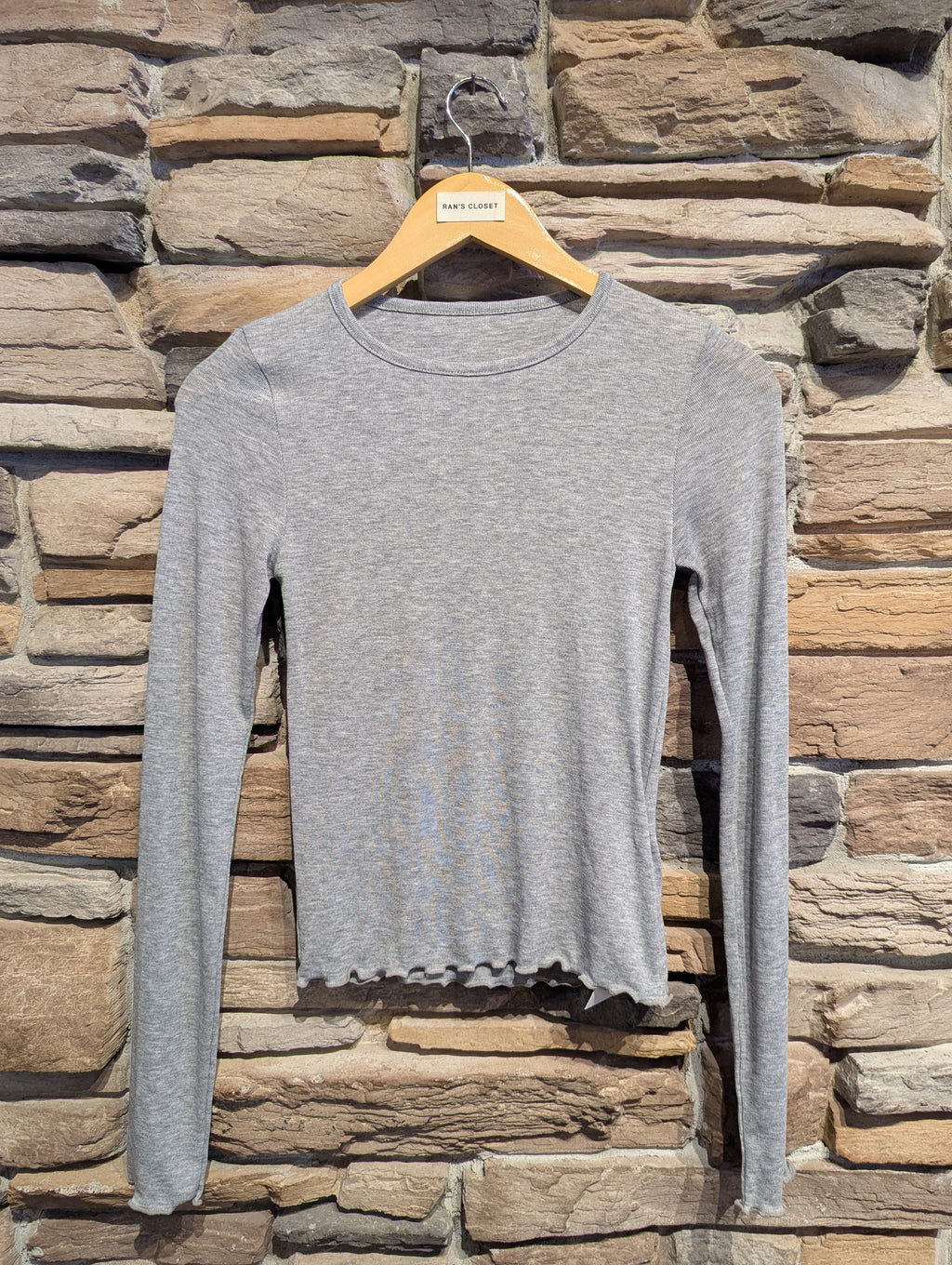 Sheer Soft Twist Lettuce Hem Top