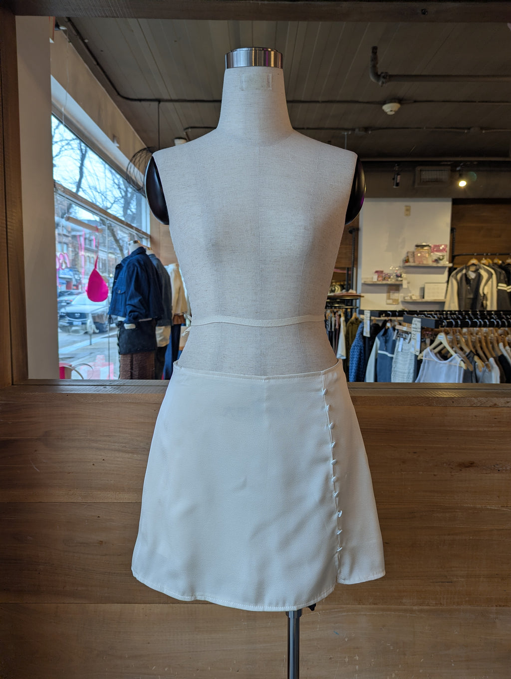 Pearl Faux Button Mini Skirt