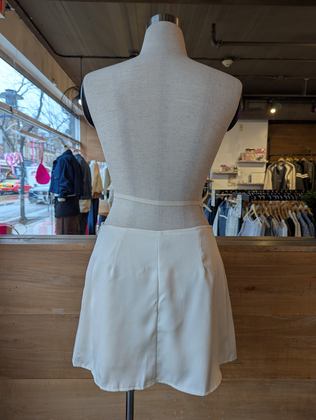 Pearl Faux Button Mini Skirt