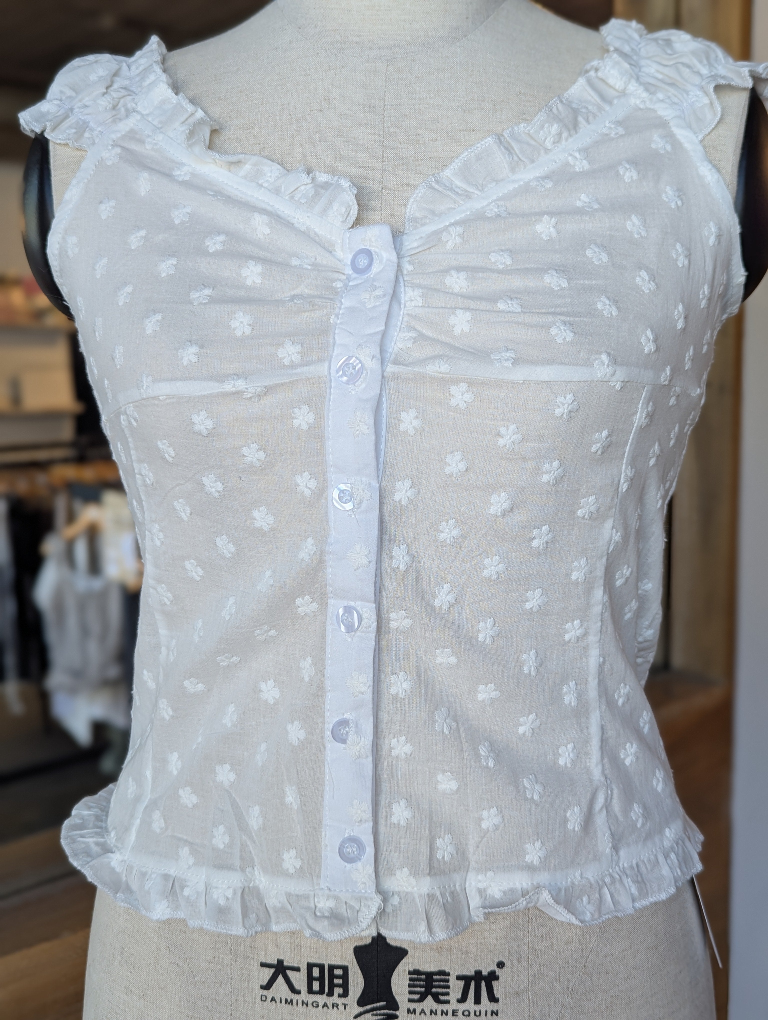 Meadow Mist Ruffle Neck Sleeveless Button-Up