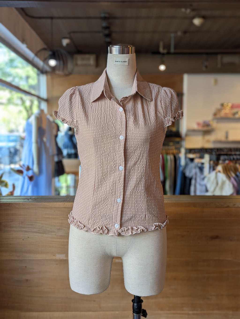 Balmy Plaid Ruffle Hem Button Down