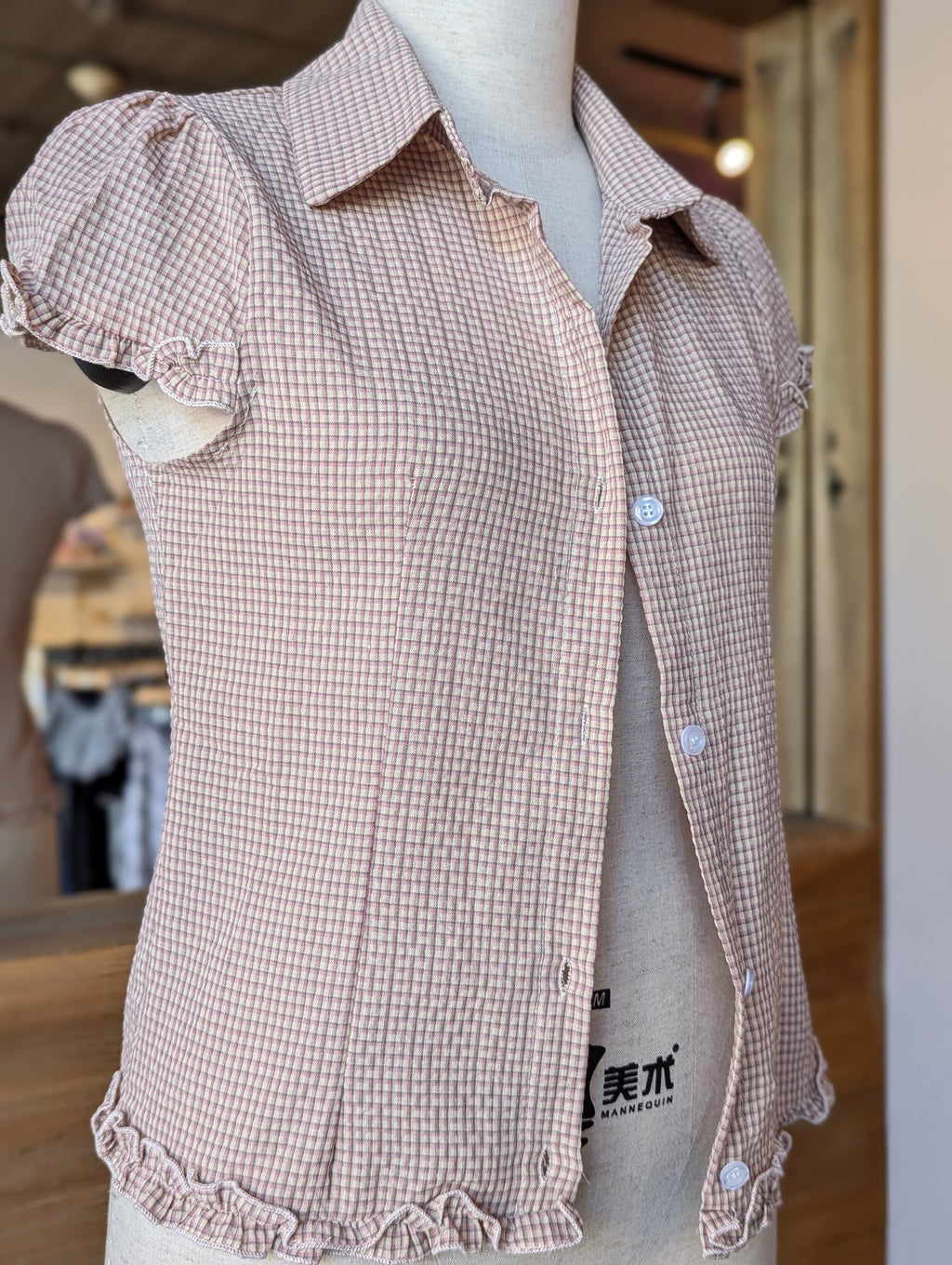 Balmy Plaid Ruffle Hem Button Down