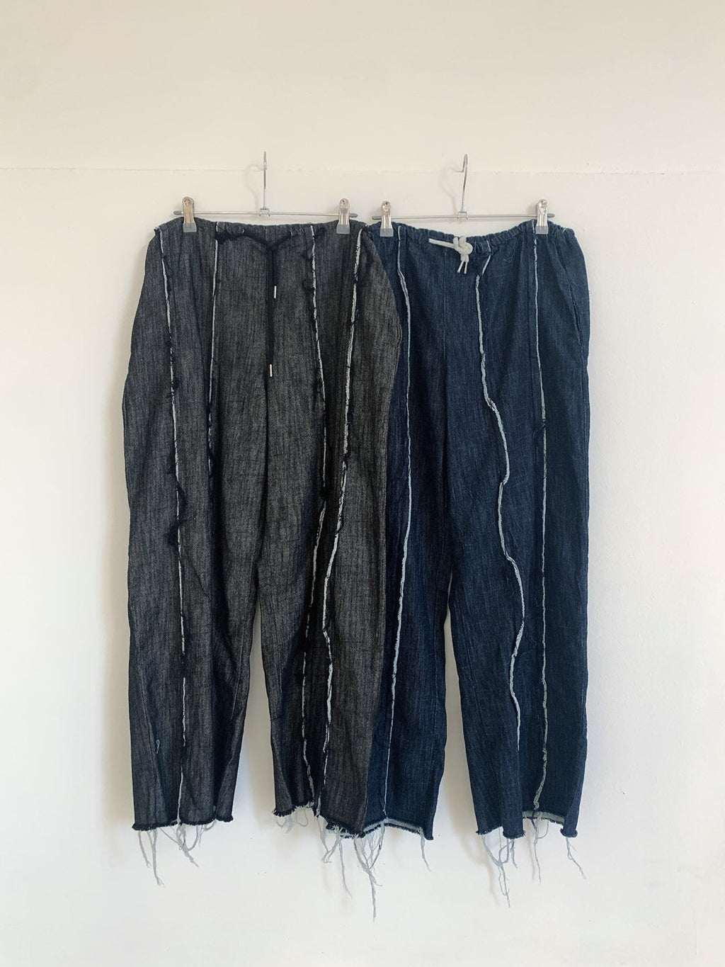 Overfit raw edge denim pants
